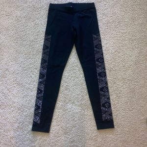 New Express leggings with rhinestone detail on legs.